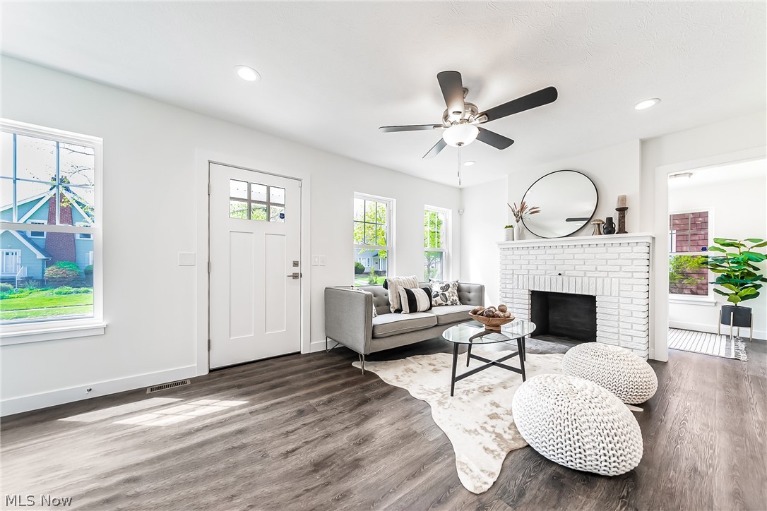 3959 Ardmore Road Cleveland Heights, OH 44121 - Photo 5 of 38 Living room with dark hardwood / wood-style floors, a fireplace, and ceiling fan
