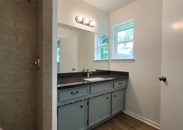 a view with cabinets and window