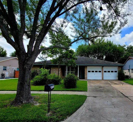 a house view with a garden space