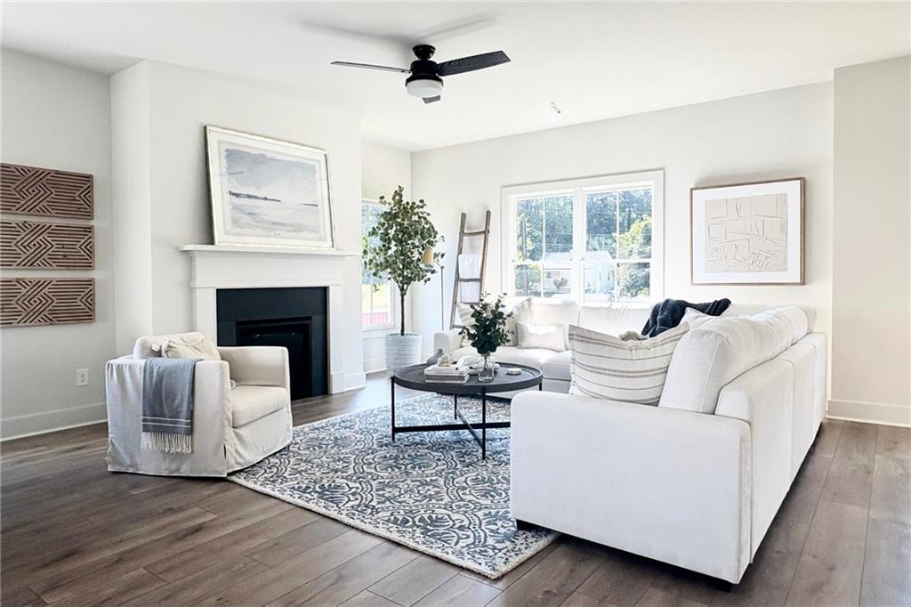 3312 Springhaven Avenue Hapeville, GA 30354 - Photo 12 of 54 a living room with furniture and a fireplace