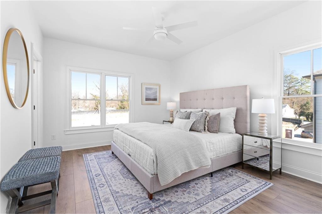 3312 Springhaven Avenue Hapeville, GA 30354 - Photo 18 of 54 a bedroom with a large bed and a window