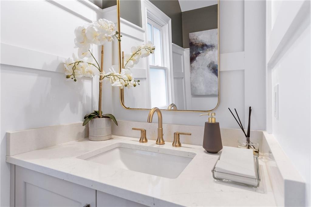 3312 Springhaven Avenue Hapeville, GA 30354 - Photo 25 of 54 a bathroom with a sink and a mirror