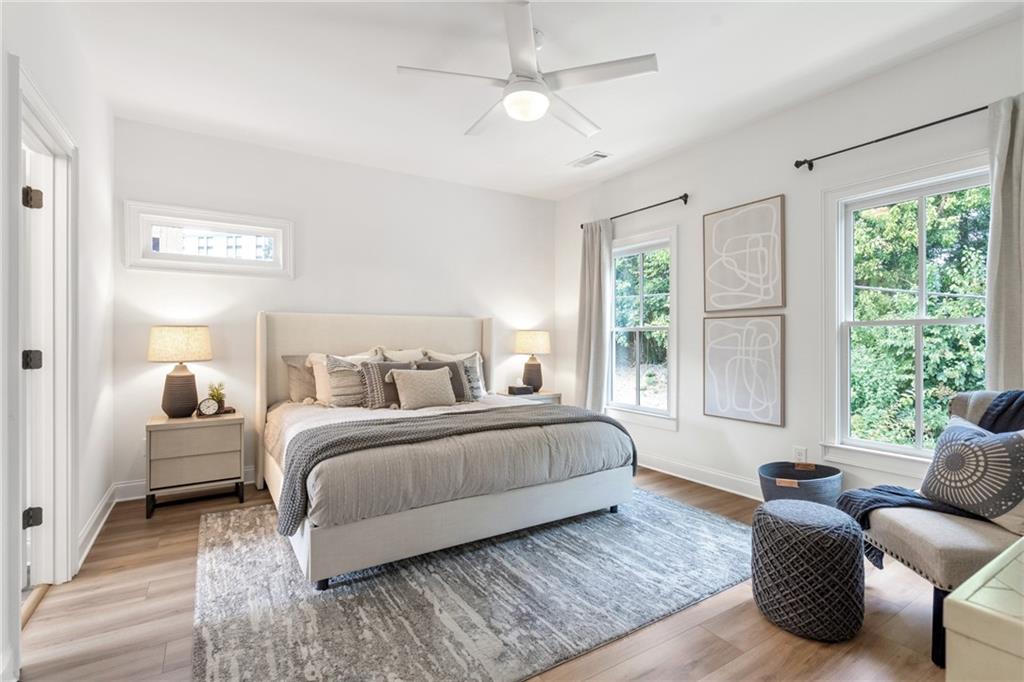 3312 Springhaven Avenue Hapeville, GA 30354 - Photo 27 of 54 a bedroom with bed couch and window