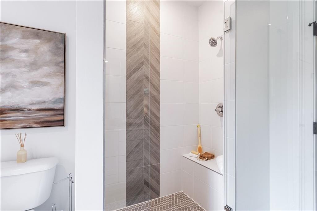 3312 Springhaven Avenue Hapeville, GA 30354 - Photo 31 of 54 a bathroom with a toilet and a shower