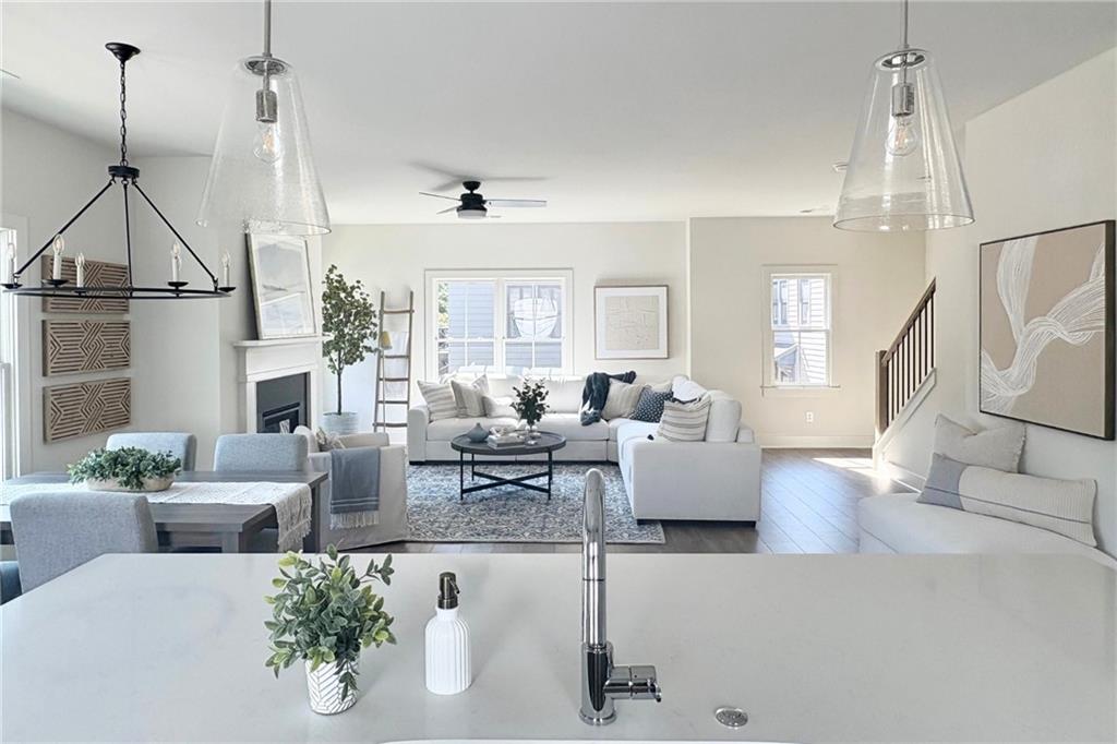 3312 Springhaven Avenue Hapeville, GA 30354 - Photo 10 of 54 a living room with furniture and a chandelier