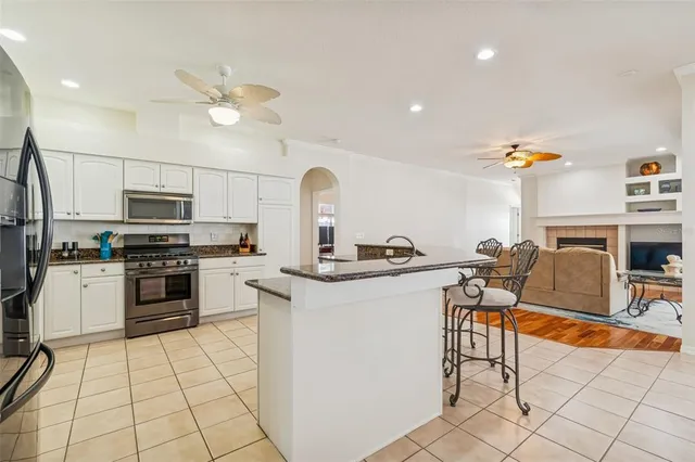 a living room with a couch and a large window