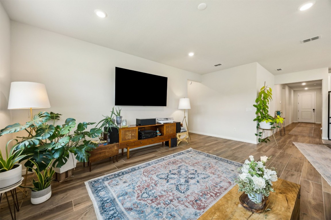 368 Muhly Grass Street Yulee, FL 32097 - Photo 11 of 60 a living room with furniture and a flat screen tv