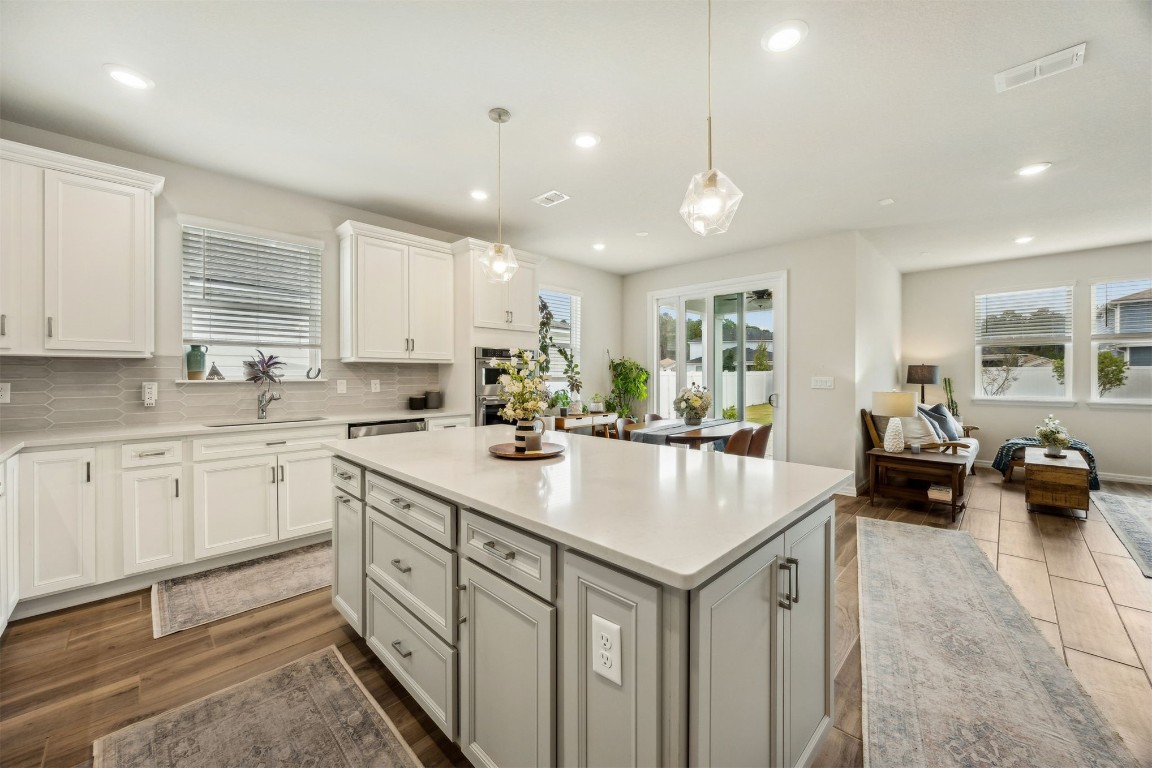 368 Muhly Grass Street Yulee, FL 32097 - Photo 16 of 60 a kitchen with sink and cabinets