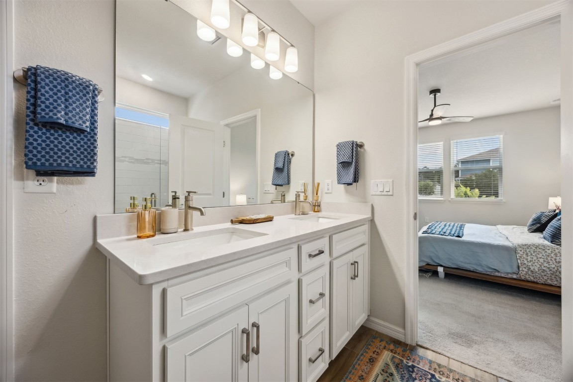 368 Muhly Grass Street Yulee, FL 32097 - Photo 24 of 60 a bathroom with a sink double vanity and a mirror