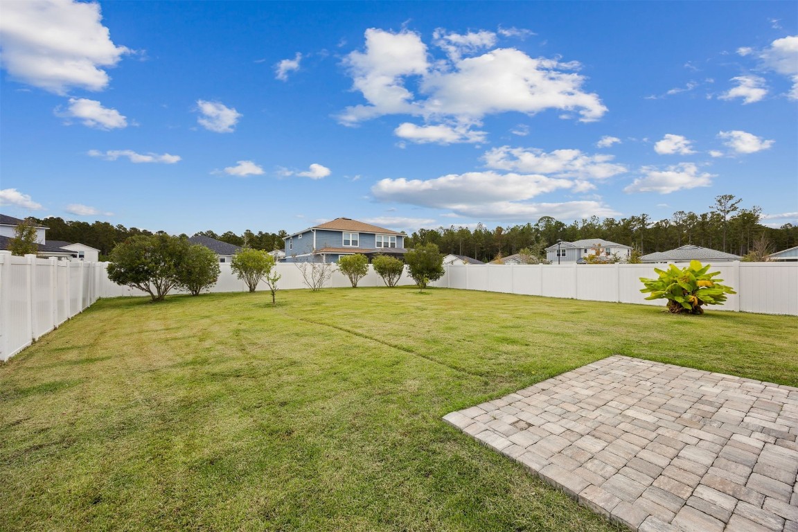 368 Muhly Grass Street Yulee, FL 32097 - Photo 35 of 60 a view of an ocean and beach