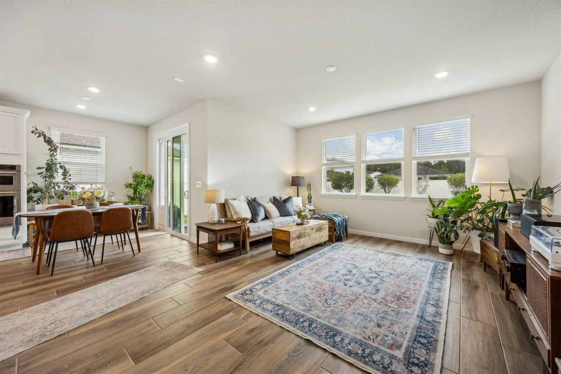 368 Muhly Grass Street Yulee, FL 32097 - Photo 10 of 60 a living room with furniture and a couch