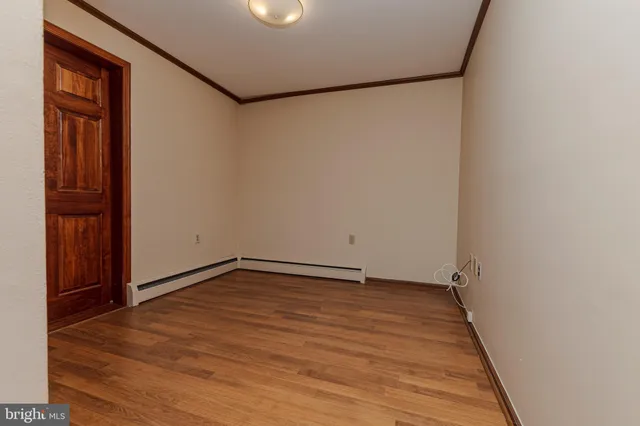 a bathroom with a toilet a sink and shower