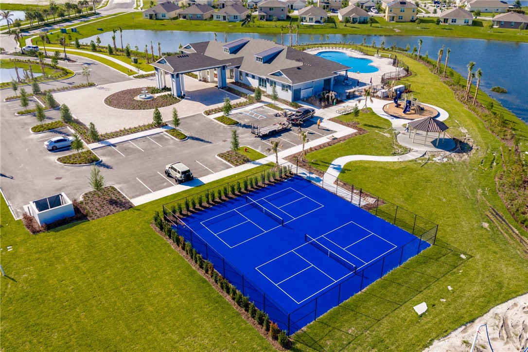 3453 Trinity Circle Fort Pierce, FL 34945 - Photo 27 of 36 swimming pool with outdoor seating
