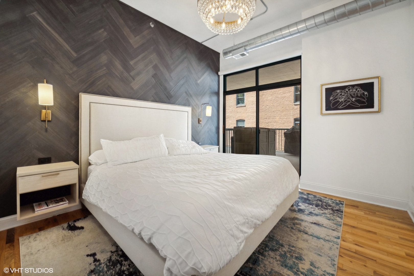 910 West Madison Street, Unit 608 Chicago, IL 60607 - Photo 9 of 15 a bedroom with a bed and a window