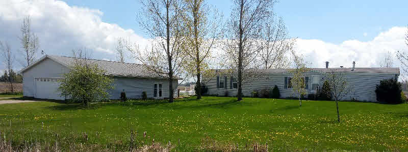 661 West Cody Estey Road Pinconning, MI 48650 - Photo 1 of 25
