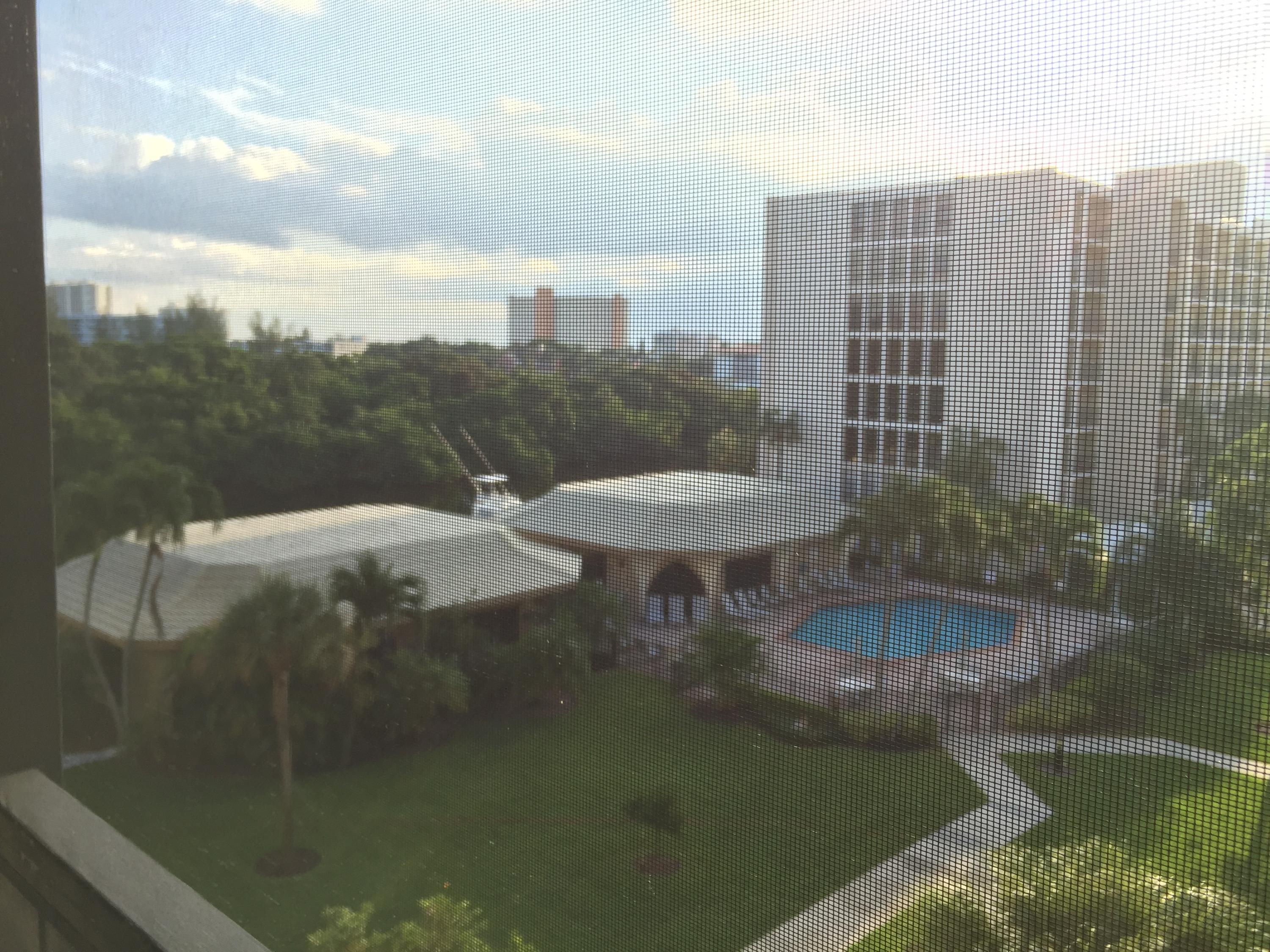 1627 Riverview Road, Unit 514 Deerfield Beach, FL 33441 - Photo 12 of 40 View of Pool & Canal From Patio