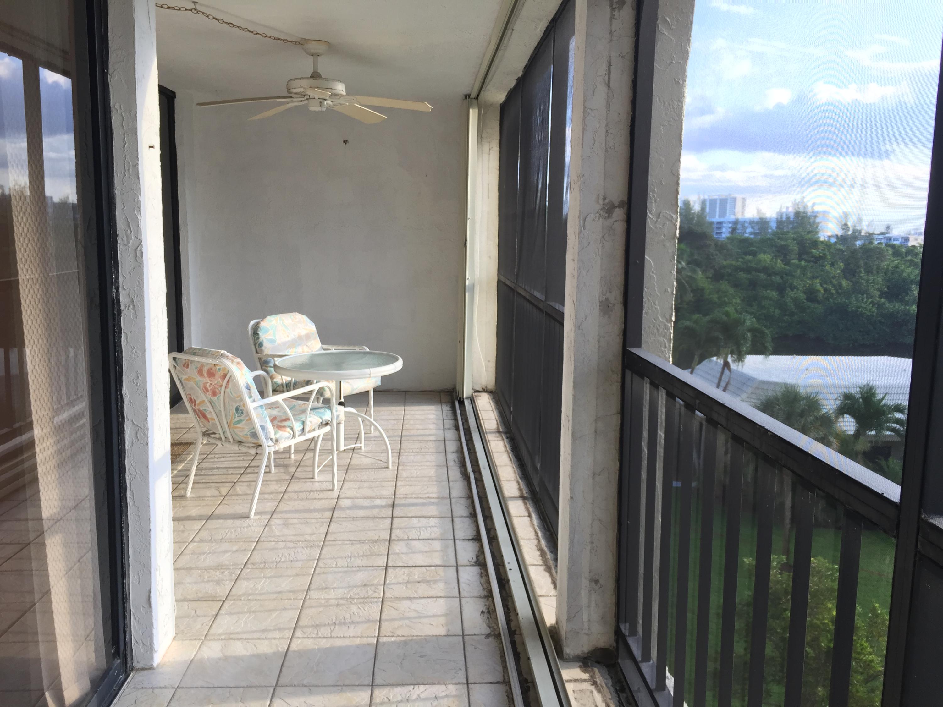 1627 Riverview Road, Unit 514 Deerfield Beach, FL 33441 - Photo 14 of 40 Canal And Pool View From Large Patio