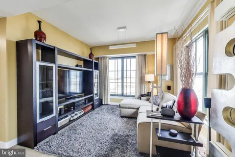 a bedroom with a bed window and furniture