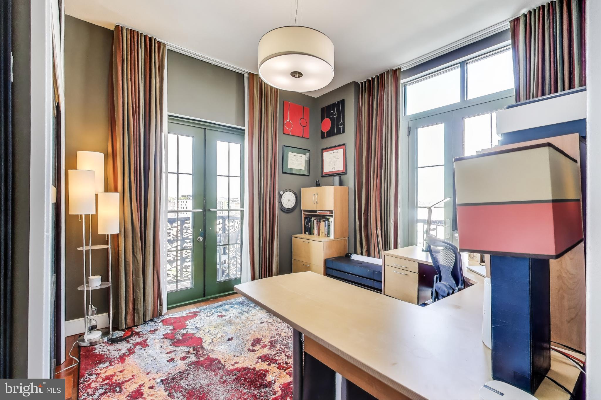 910 M Street Northwest, Unit 1022 Washington, DC 20001 - Photo 26 of 64 a bedroom with a bed dresser and a window