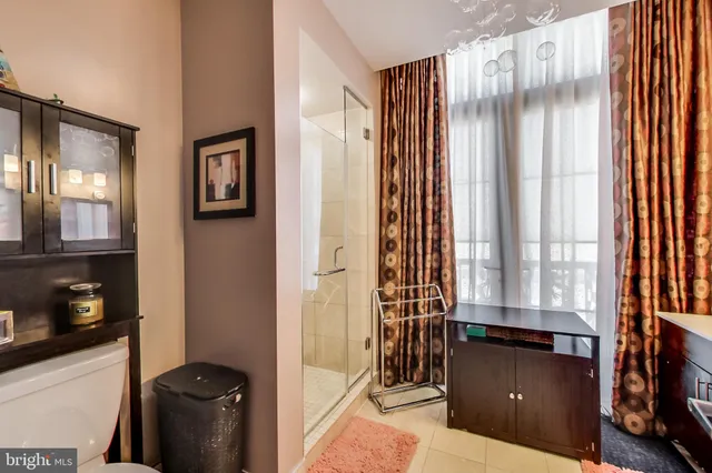 a picture of a bathroom with a sink and a mirror