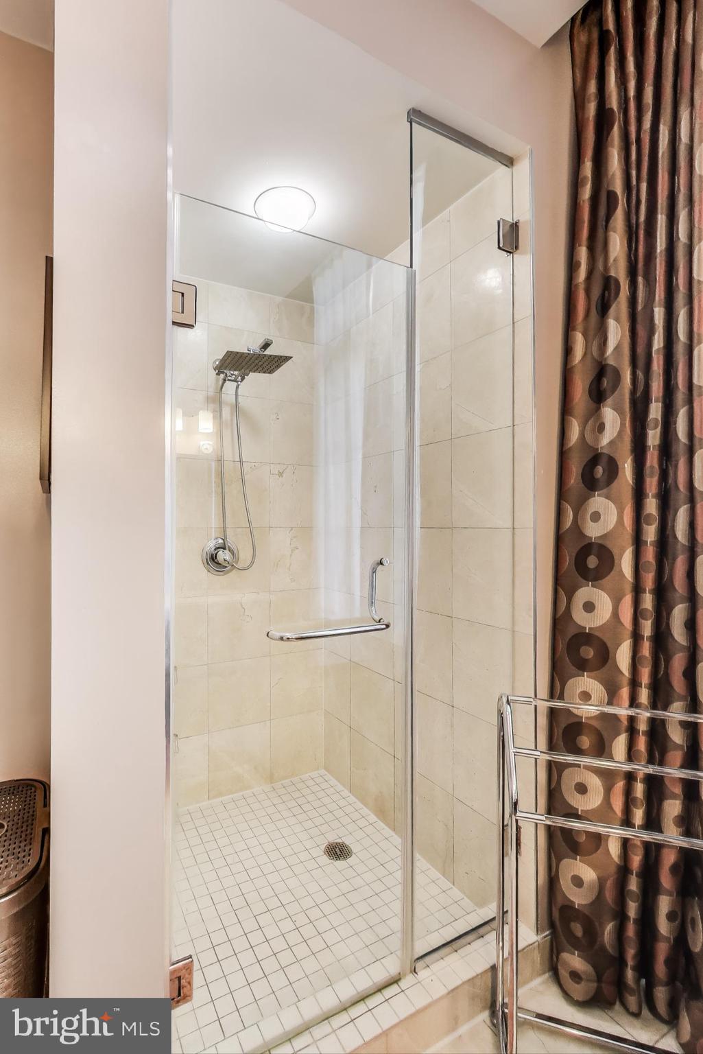 910 M Street Northwest, Unit 1022 Washington, DC 20001 - Photo 29 of 64 a bathroom with a shower