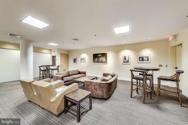 a view of a terrace with furniture