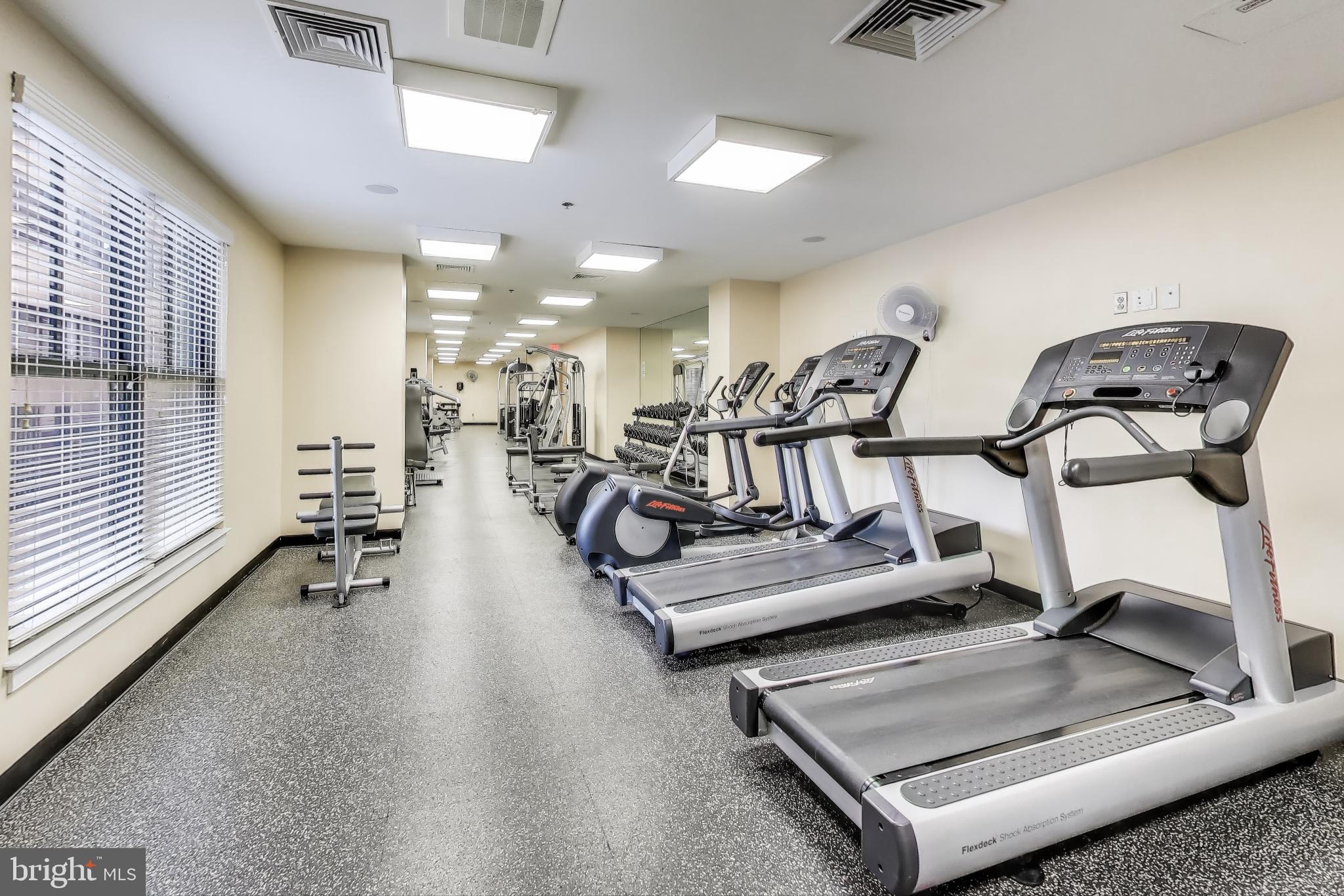 910 M Street Northwest, Unit 1022 Washington, DC 20001 - Photo 43 of 64 a view of a room with gym equipment