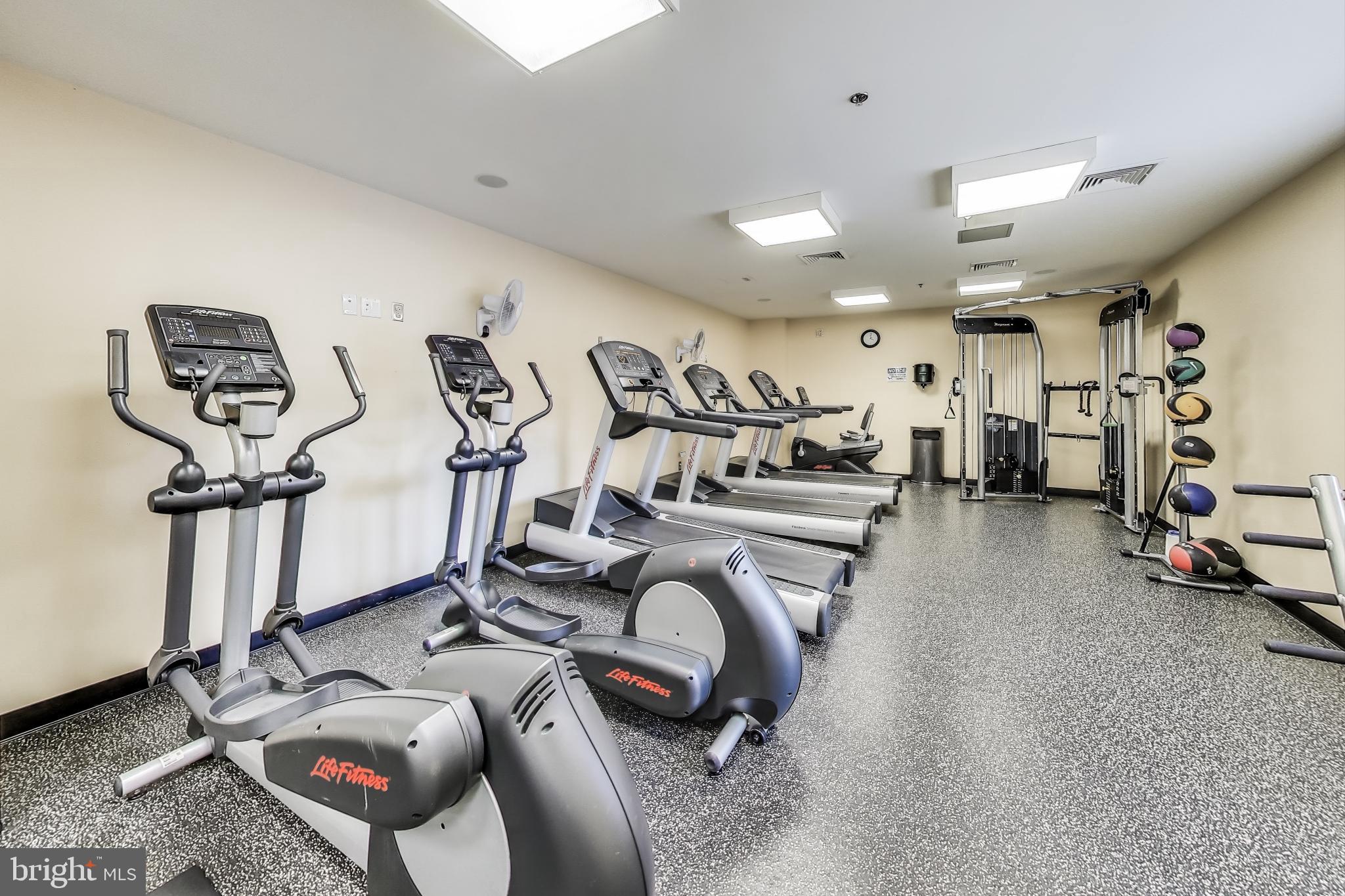 910 M Street Northwest, Unit 1022 Washington, DC 20001 - Photo 44 of 64 a view of a room with gym equipment
