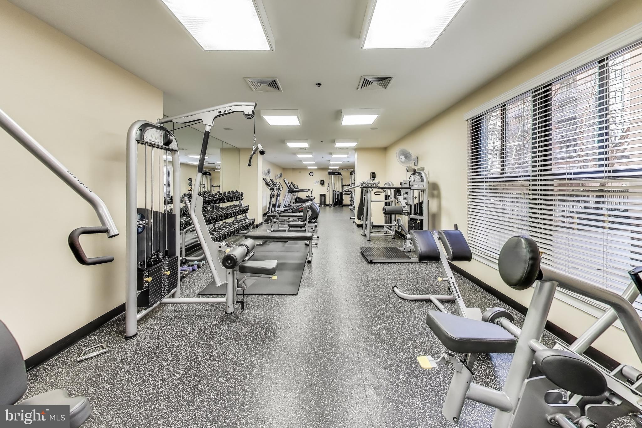 910 M Street Northwest, Unit 1022 Washington, DC 20001 - Photo 45 of 64 a view of a room with gym equipment