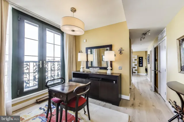 a view of a dining room with furniture window and outside view