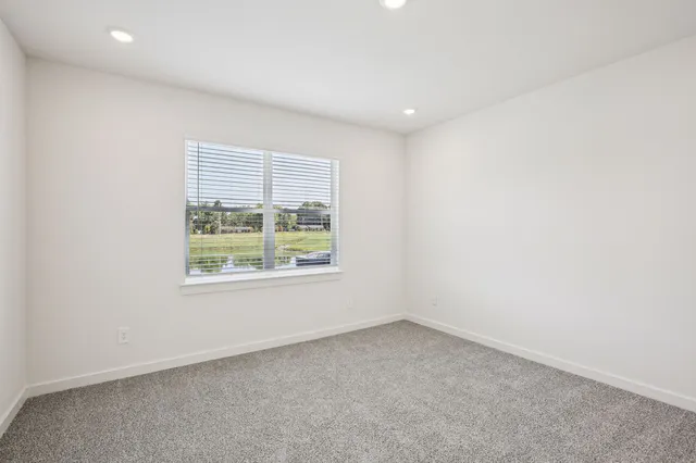 an empty room with a window