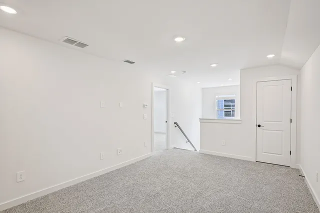 a bathroom with a shower and a bathtub