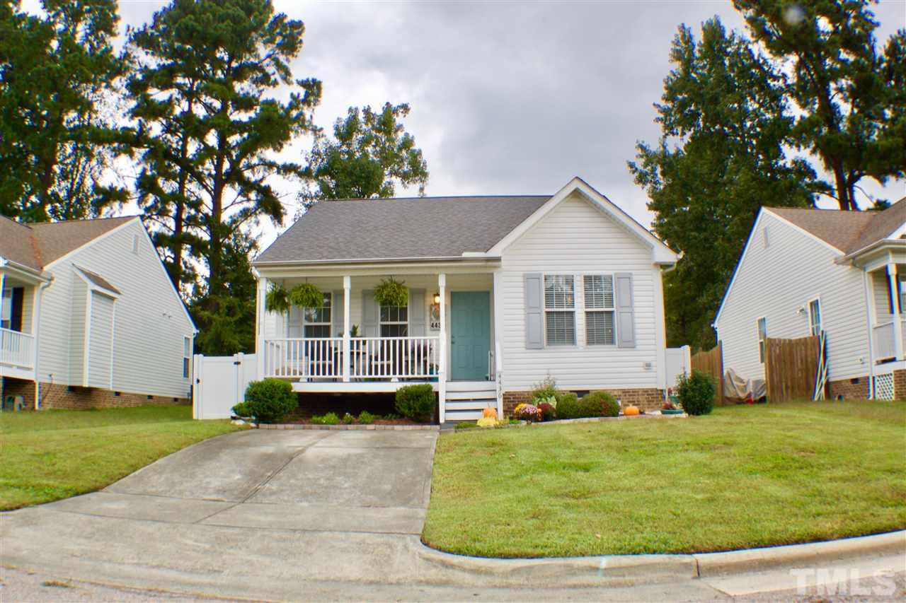 4436 Archibald Way Raleigh, NC 27616 - Photo 1 of 25 a front view of a house with a yard