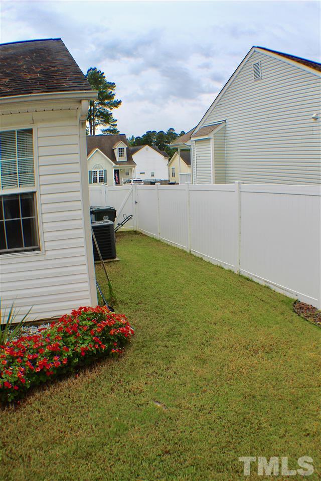 4436 Archibald Way Raleigh, NC 27616 - Photo 25 of 25 a backyard of a house