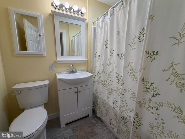 a storage room with washer and dryer
