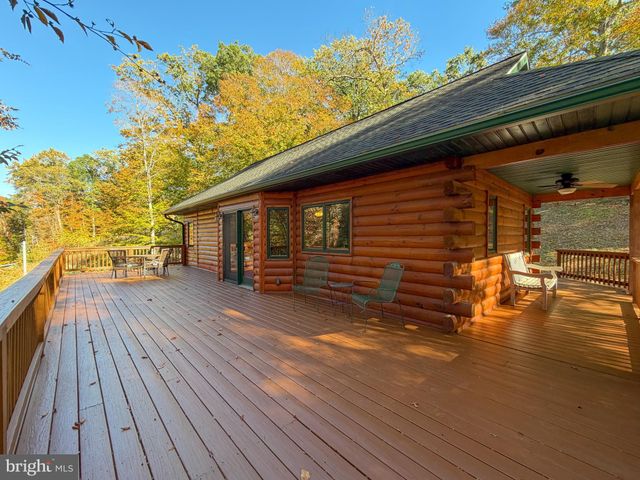 a view of a chairs on the roof deck