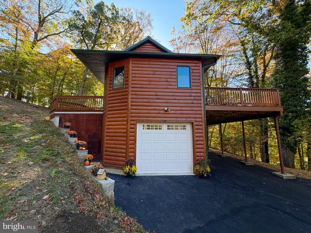 a view of a house with a deck