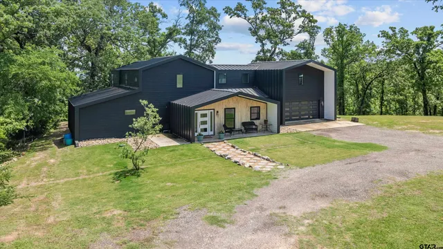 a house with garden in front of it