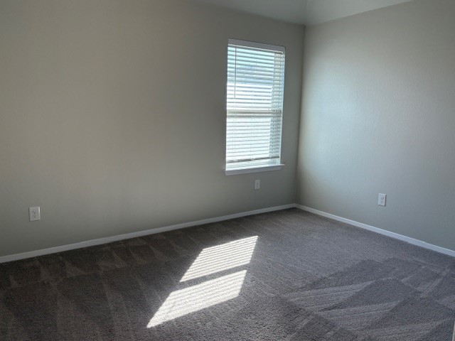 5601 Corso Court Austin, TX 78747 - Photo 12 of 18 an empty room with a window