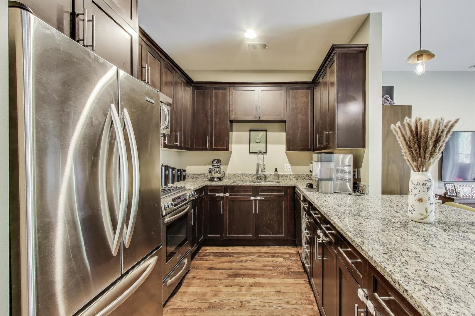 2120 West Rice Street, Unit 3 Chicago, IL 60622 - Photo 11 of 28 a large kitchen with a sink and stainless steel appliances