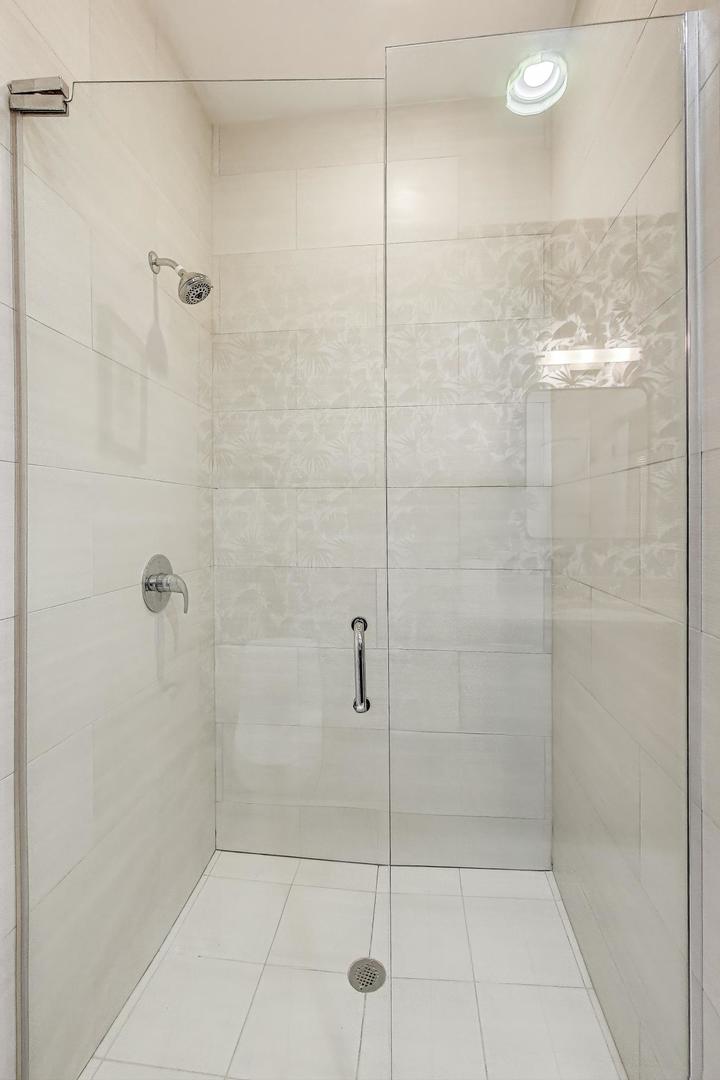 2120 West Rice Street, Unit 3 Chicago, IL 60622 - Photo 26 of 28 a bathroom with a shower
