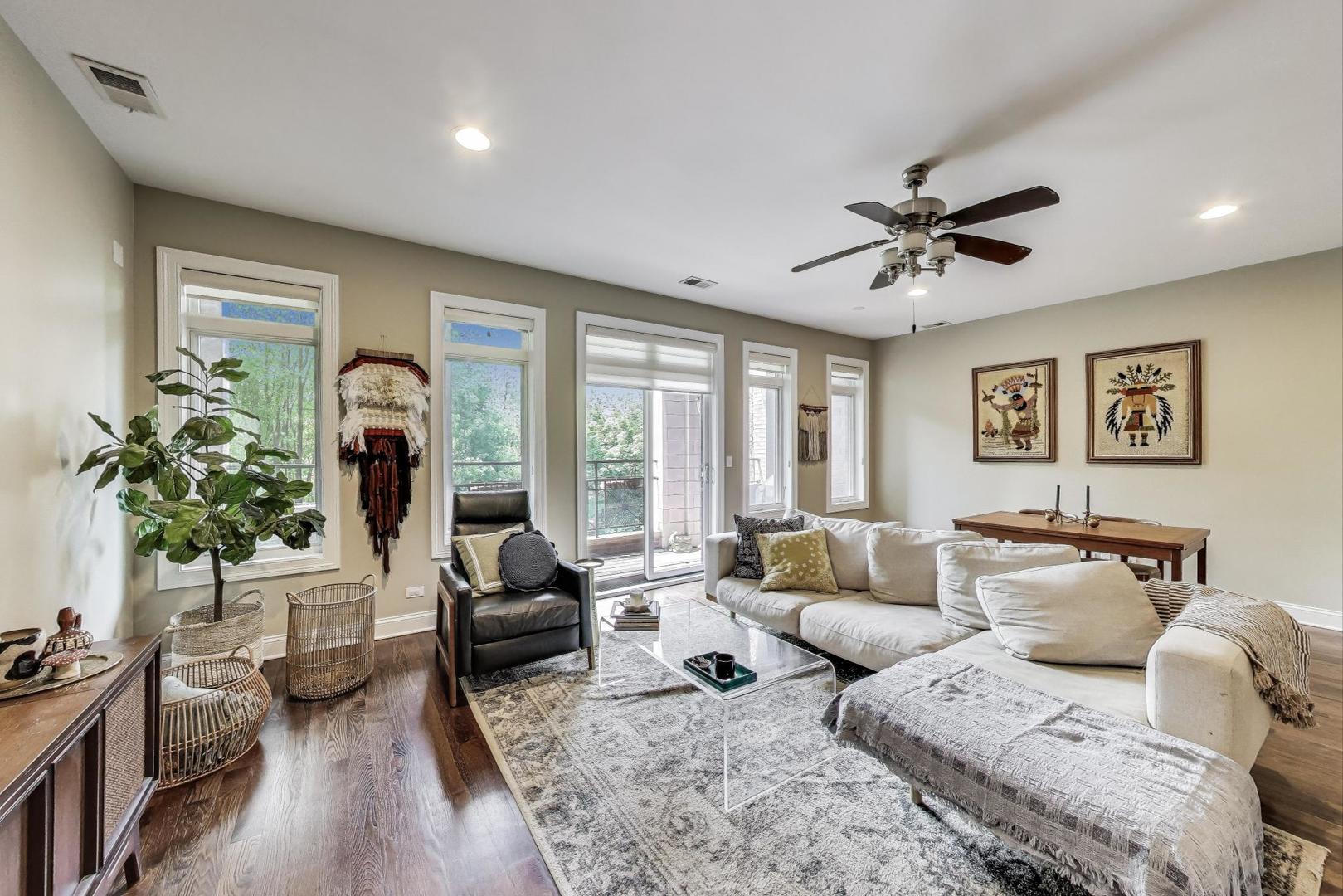 2120 West Rice Street, Unit 3 Chicago, IL 60622 - Photo 3 of 28 a living room with furniture and a large window