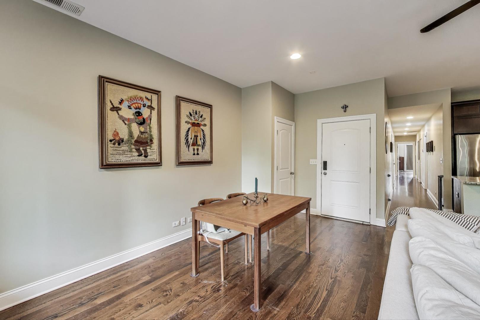 2120 West Rice Street, Unit 3 Chicago, IL 60622 - Photo 6 of 28 a living room with furniture and a wooden floor