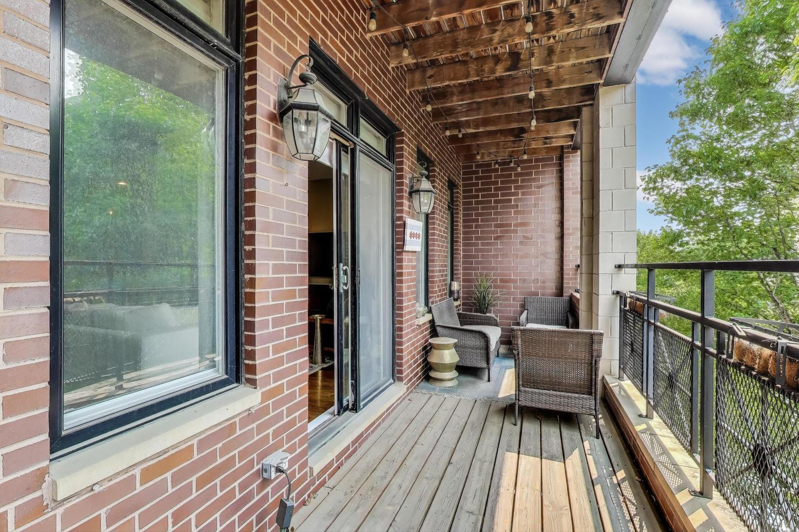 2120 West Rice Street, Unit 3 Chicago, IL 60622 - Photo 8 of 28 a view of balcony with couch