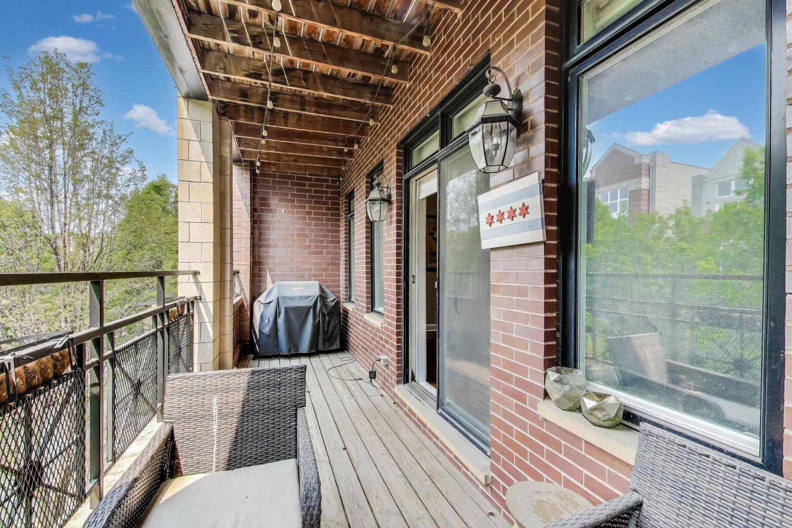 2120 West Rice Street, Unit 3 Chicago, IL 60622 - Photo 9 of 28 a view of a balcony with furniture