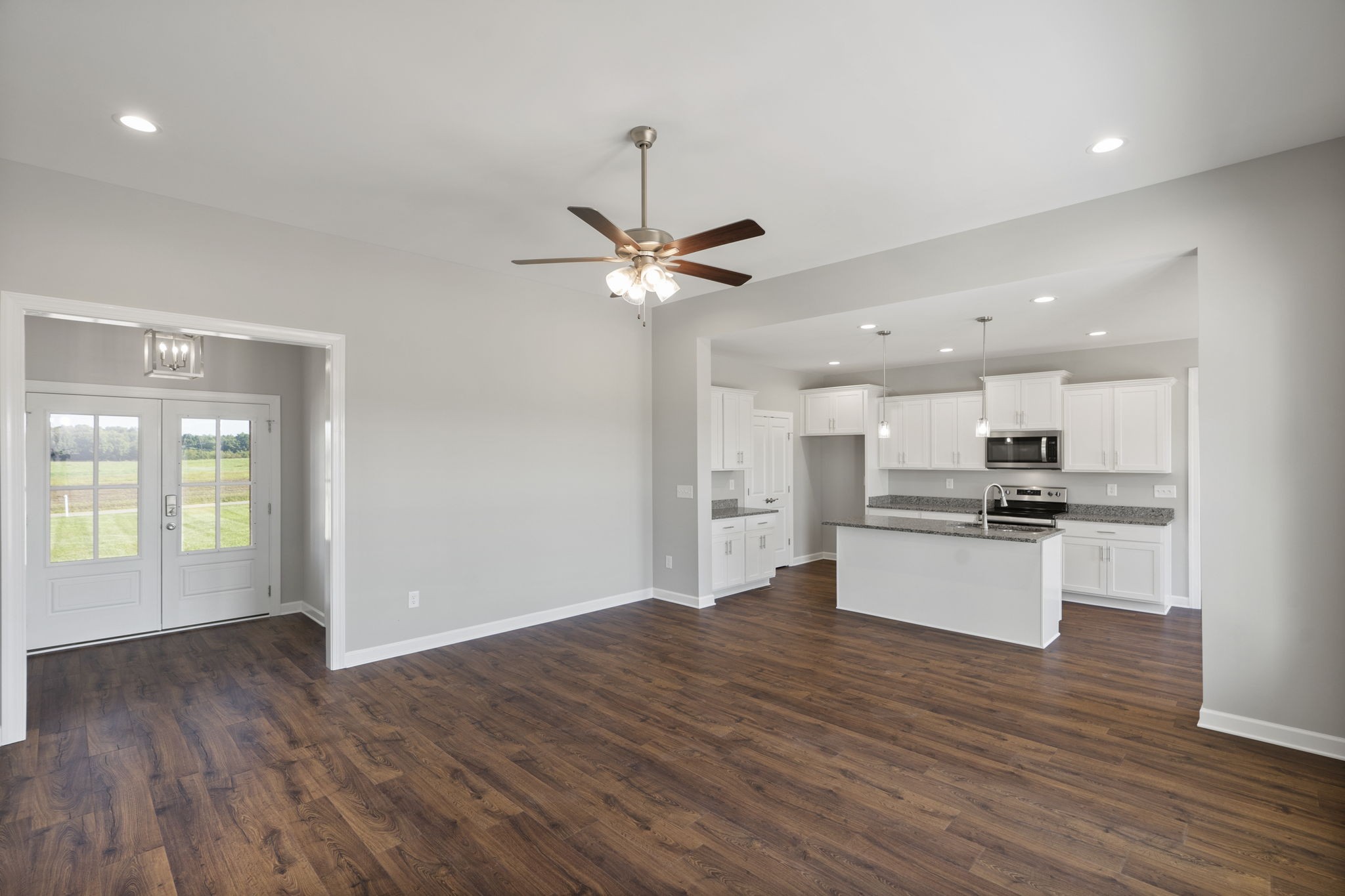 5557 Borthick Road Springfield, TN 37172 - Photo 12 of 48 a view of kitchen with sink microwave and stove