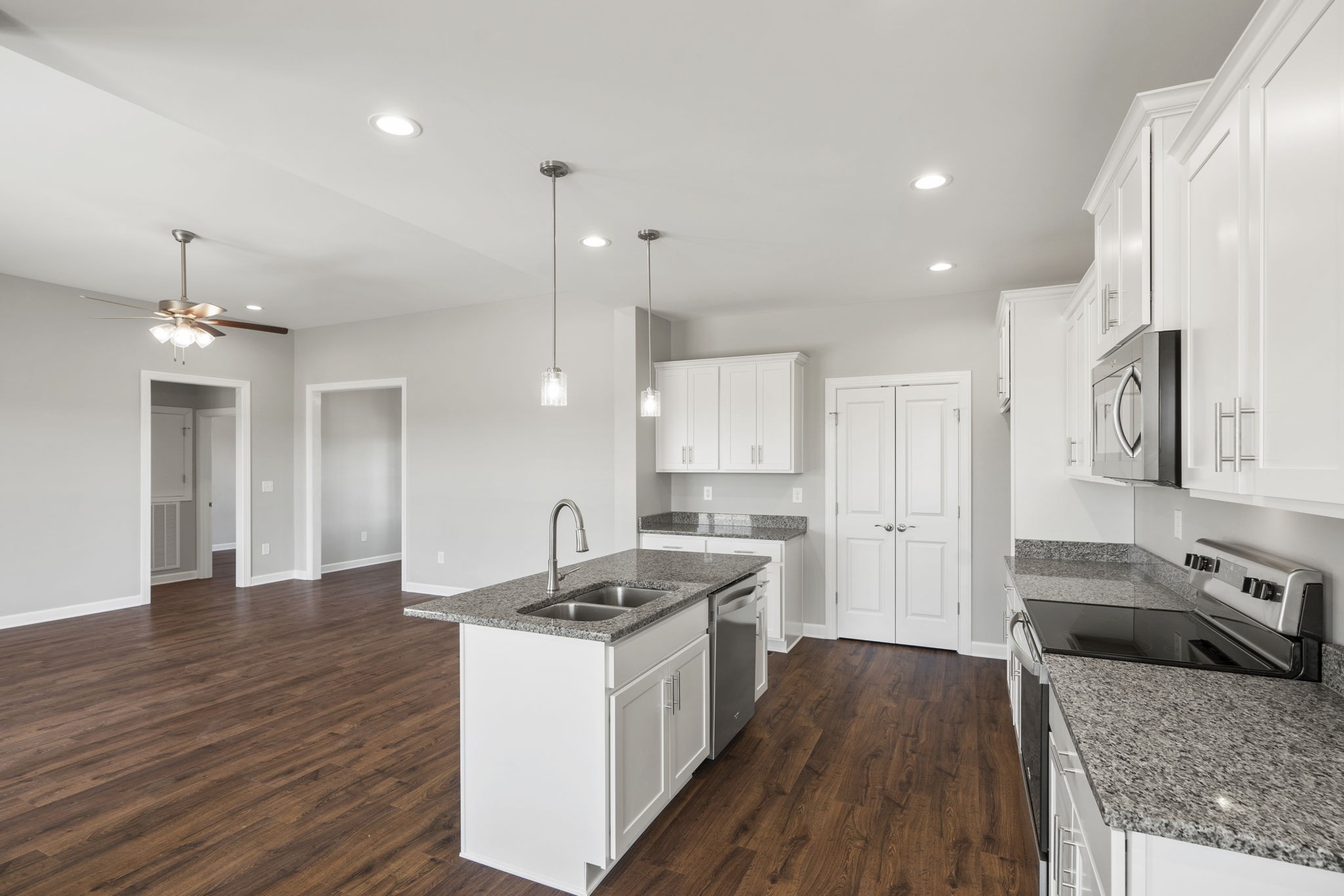 5557 Borthick Road Springfield, TN 37172 - Photo 18 of 48 a kitchen with a sink stove and refrigerator