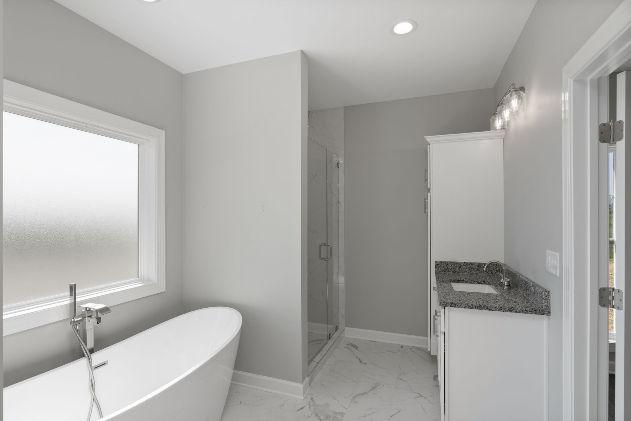 5557 Borthick Road Springfield, TN 37172 - Photo 26 of 48 a bathroom with a granite countertop sink and a mirror