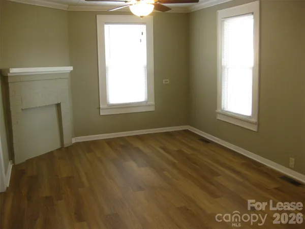 a view of an empty room and window