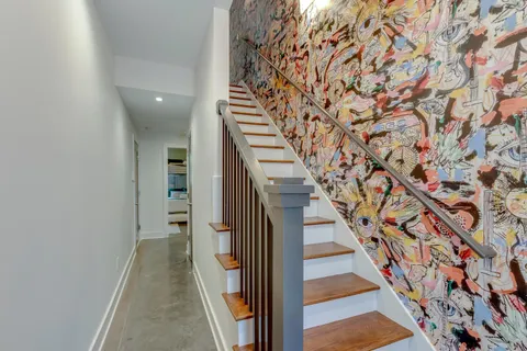 a view of entryway with wooden floor